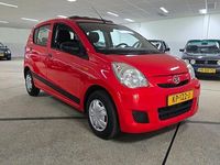 Occasion Daihatsu Cuore 69 PK (50 kW) 2008 Rood Hatchback