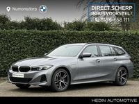 Occasion BMW 320e 165 PK (121 kW) 2023 Grijs (metallic) Stationwagen
