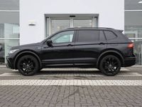 tweedehands VW Tiguan Allspace 1.5 TSI 150 7DSG R-Line Business Automatisch Zijruiten achter en achterruit getint 65 lichtabsorberend R-Line exterieurpakket 'Black Style' Panoramaschuif-kanteldak, elektrisch bedienbaar Koplampverlichting LED 'M...