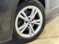 tweedehands BMW X1 sDrive18i Executive | Navigatie | LM Velgen 17" | Trekhaak 1.700kg Geremd | PDC Voor en Achter |