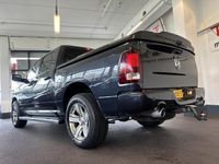 tweedehands Dodge Ram 15005.7 V8 4x4 Quad Cab 6'4 Nederlands geleverd | Panoramadak | Alpine audio | Trekhaak | Keyless start | Stoel+Stuurverwarming | Stoelkoeling | Achteruitrijcamera | Cruise control | Climate control | Lederen bekleding | Navigatie