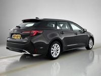 Occasion Toyota Corolla Hybrid Limited 2024 Bruin Stationwagen