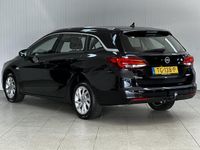 tweedehands Opel Astra Sports Tourer 1.4 Business Executive /150PK! /Apple + Android /KEYLESS! /Trekhaak /DAB+! /Navi /Climat /Cruise /Elek. pakket /Bluetooth /Regensensor /16"LMV /PDC V+A /LED Dagrijverl. /Chroom.