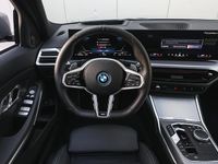 Occasion BMW 330e Executive 292 PK (214 kW) 2025 Grijs Stationwagen