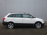 tweedehands Skoda Fabia Combi 1.2 TSI Scout Automaat Climate / Trekhaak / Navi