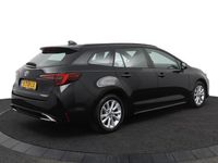 Occasion Toyota Corolla 140 PK (102 kW) 2023 Zwart (metallic) Stationwagen
