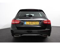 tweedehands Mercedes 200 C-klasse Estate184pk 9G Tronic AMG Line | Navigatie | Climate Co