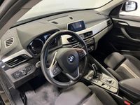 tweedehands BMW X1 sDrive18i Executive | Navigatie | LM Velgen 17" | Trekhaak 1.700kg Geremd | PDC Voor en Achter |