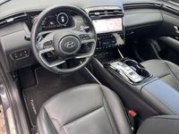 tweedehands Hyundai Tucson 1.6 T-GDI PHEV N Line Sky 4WD / ¤ 7.200,- Voordeel / ¤ 46.990,- Rijklaar / GROOT Glazen schuif-kanteldak / Stoel verwarming+verkoeling / Navigatie + Apple Carplay/Android Auto / Climate Control /