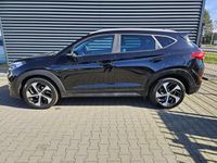 tweedehands Hyundai Tucson 1.6 T-GDi Premium 4WD 177pk Automaat 56419 km | Lederen Bekleding | Camera | Navi | 19"L.M DAB | Laneassist | Stuurverwarming |