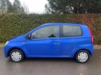 Occasion Daihatsu Cuore 59 PK (43 kW) 2008 Blauw (metallic) Hatchback