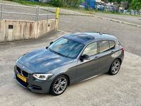tweedehands BMW M135 1-serie i 320PK! xDrive Aut/Leer/Dak/H&K VOL!