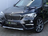 tweedehands BMW X1 sDrive20i Orange Edition III / Panorama / Trekhaak