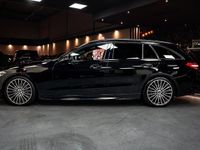 Occasion Mercedes C200 AMG line 204 PK (150 kW) 2022 Zwart Stationwagen