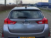 Occasion Toyota Auris Hybrid 136 PK (100 kW) 2014 Brons Sedan