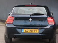 tweedehands BMW 114 114 i Upgrade Edition Xenon/Navigatie/Leer/Parkeers