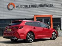 Occasion Toyota Corolla Hybrid 196 PK (144 kW) 2024 Rood Stationwagen