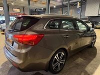 Occasion Kia Ceed Sportswagon 135 PK (99 kW) 2014 Bruin (metallic) Stationwagen