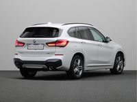 tweedehands BMW X1 xDrive20i High Executive | Head-Up Display | Glazen panoramadak | Elektrisch verwarmde voorstoelen | Navigatiesysteem Plus |