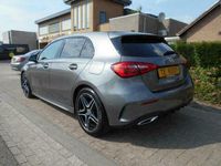 tweedehands Mercedes A180 AMG|SFEERVERLICHTING|ADAPTIVE CRUISE|BI COLOR BEKLEDING|NAVIGATIE