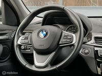 tweedehands BMW X1 sDrive20i Executive Panodak HUD Navi Leer Cruise Dealer onderhouden