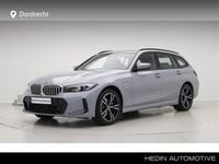 Occasion BMW 320e Shadowline 165 PK (121 kW) 2024 Brooklyn grau metallic (grijs metallic) Stationwagen
