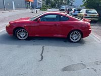 Occasion Hyundai Coupé 167 PK (122 kW) 2003 Rood Coupé