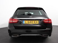 tweedehands Mercedes 200 C-KLASSE Estate184pk 9G Tronic AMG Line Hybride | Navigatie | Climate Control | Keyless | Camera | Electrisch bedienbare achterklep | Lichtmetalen velgen