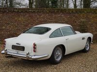 tweedehands Aston Martin DB4 Series 3 Full restored by Works Service in the UK, Extensive restoration-report with photos, Original left-hand drive model, Executed in Dover White over Magnolia with Oxblood piping, Fitted with the high performance 'Special