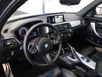 tweedehands BMW M140 1-SERIEEdition Shadow High Executive | 340 PK | Harman / Kardon | Apple CarPlay | Schuif / kantel dak | Vol lederen memory sportstoelen met verwarming | Cruise | Clima | Nederlands geleverde | LED kolampen | Lane en bots assist |