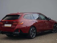 Occasion BMW 550e M Sport 489 PK (359 kW) 2025 Rood Stationwagen