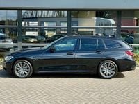 Occasion BMW 330e Executive 292 PK (214 kW) 2022 Zwart Stationwagen