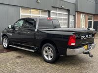 tweedehands Dodge Ram PICKUP 1500 5.7 V8 4x4 Crew Cab 5'7 Lpg en benzine Airco Cruise Controle Stoelverwarming Stuurverwarming Lederbekleding Stuurwielbedingen Telefoon verbinding Chromen accenten Elec zonnedak Hardtop deksel Pick-up Open laadbak Je