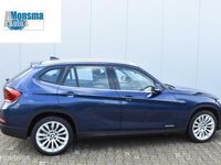 tweedehands BMW X1 sDrive20i AUT. Chrome Line 2013 Tiefseeblau Xenon Navi Clima Cruise 18" LMV PDC Trekhaak