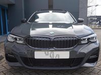 tweedehands BMW 330 3-SERIE Touring i High Executive M-sport / panoramadak / automaat /