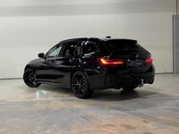Occasion BMW 330 Shadowline 184 PK (135 kW) 2024 Zwart Stationwagen