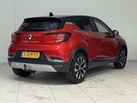 Occasion Renault Captur Techno 158 PK (116 kW) 2023 Twotone rouge flamme / noir é SUV