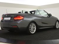 tweedehands BMW 230 2-SERIE Cabrio i High Executive M Sport Automaat / Sportstoelen / Stoelverwarming / Harman Kardon / Navigatie Professional / Adaptieve LED / Cruise Control / Achteruitrijcamera