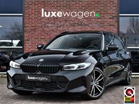 Occasion BMW 330e M Sport 292 PK (214 kW) 2022 Zwart (metallic) Stationwagen