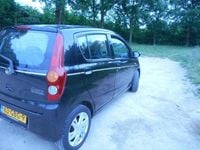 Occasion Daihatsu Cuore 69 PK (50 kW) 2008 Zwart Hatchback