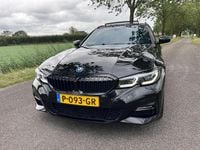 Occasion BMW 330e Executive 184 PK (135 kW) 2022 Zwart Stationwagen