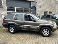 tweedehands Jeep Grand Cherokee 4.7i V8 Limited , lezen !!