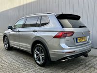 tweedehands VW Tiguan Allspace 1.5 TSI HIGHLINE DSG R-LINE 7-PERSOONS PANO/DYNAUD