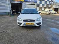 tweedehands Ford Focus Wagon 1.4-16V Ambiente Goed rijdende en ruime gezinsauto,Airco,Electr pakket,Apk 17-02-2024.