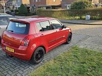 Occasion Suzuki Swift 92 PK (67 kW) 2009 Rood Sedan