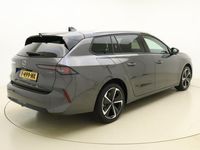 tweedehands Opel Astra Sports Tourer 1.6 Hybrid Business Elegance | Navigatie | Stoel & Stuurverwarming | Lichtmetalen velgen | Getint glas | Électric achterklep