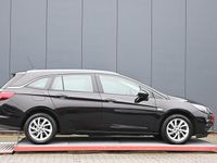 Occasion Opel Astra Business Elegance 146 PK (107 kW) 2022 Zwart (metallic) Stationwagen