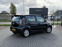 Occasion Daihatsu Sirion 93 PK (68 kW) 2011 Zwart Hatchback