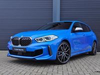 tweedehands BMW M135 1-SERIE i xDrive | Pano | Sportstoelen | HK | 19" | Live Cockpit | Misano blauw