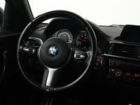 Occasion BMW 118 Executive 136 PK (100 kW) 2018 Rood Hatchback